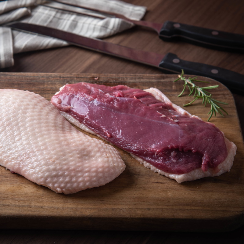 Raw Duck Breast Meat On Cutting Board